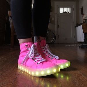 Hot pink high top sneakers with LED lights